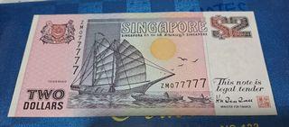 BRAND NEW $2 Singapore Dollars (Ships series - ZM 077777)