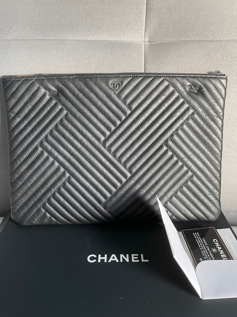 Chanel o case, Women's Fashion, Bags & Wallets, Clutches on Carousell