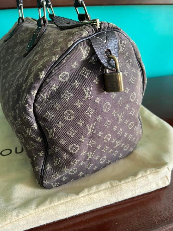 Louis Vuitton Speedy mini $999 excellent condition comes with lock