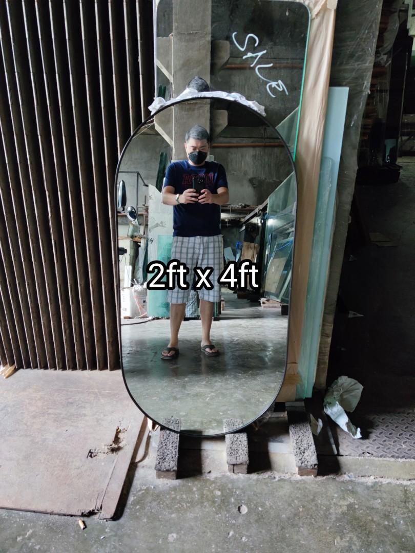 Oval Mirror with frame (Category: Mirrors) located in Malabon City. Submitted by mirrors.ph (Listing ID 1180108057, Image 1). Description: Oval mirror with black aluminum frame and plywood backing. Using 6mm thick copper free lead free mirror. Size: 2ft x 4ft P2160 Add P200 if with back hook. Available colors gold, glossy black, matte black, white and silver aluminum frame. Customize sizes and shapes are welcome..