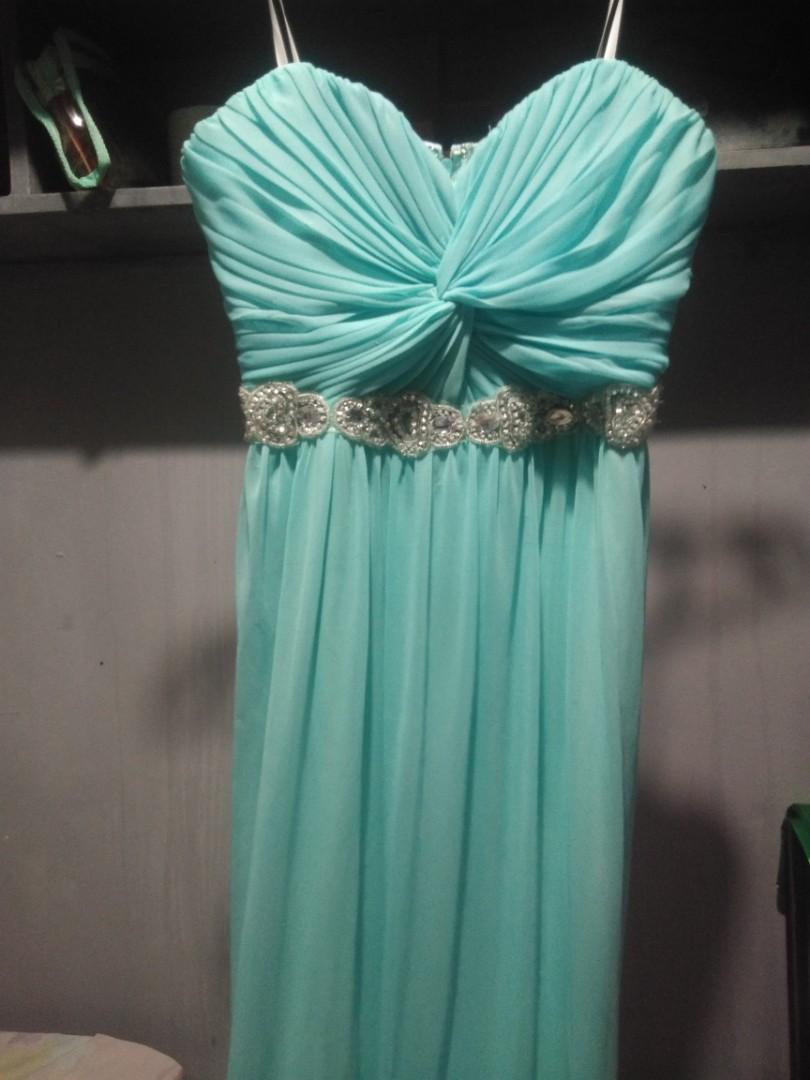Tube Long gown (Category: Evening dresses & gowns) located in Marikina City. Submitted by jenzitems (Listing ID 1180191711, Image 1). Description: Tube style (35cm) Long gown (115cm) Turtoise in color Rfs: Decluttering Only used once.