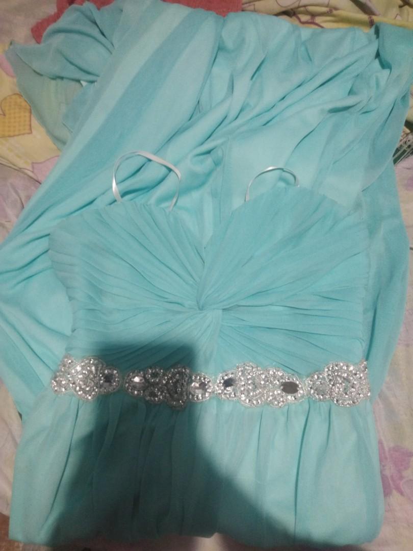 Tube Long gown (Category: Evening dresses & gowns) located in Marikina City. Submitted by jenzitems (Listing ID 1180191711, Image 2). Description: Tube style (35cm) Long gown (115cm) Turtoise in color Rfs: Decluttering Only used once.