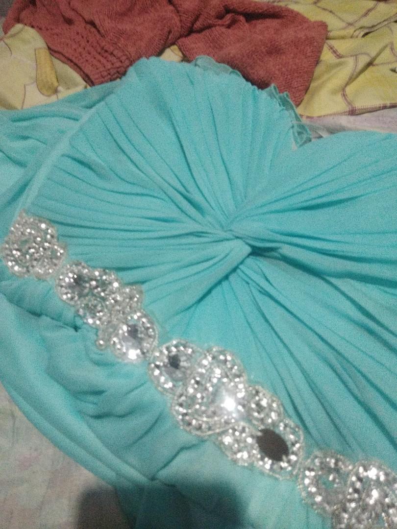 Tube Long gown (Category: Evening dresses & gowns) located in Marikina City. Submitted by jenzitems (Listing ID 1180191711, Image 3). Description: Tube style (35cm) Long gown (115cm) Turtoise in color Rfs: Decluttering Only used once.