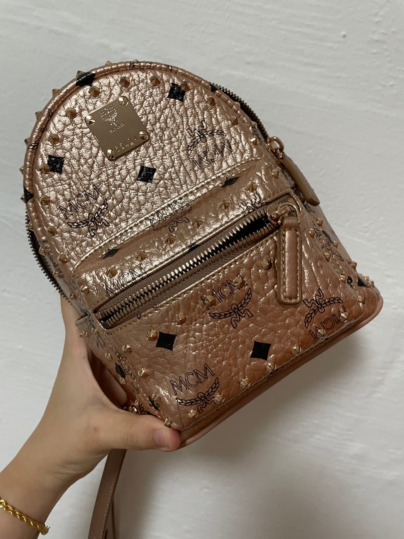 MCM rose gold mini backpack, Luxury, Bags & Wallets on Carousell