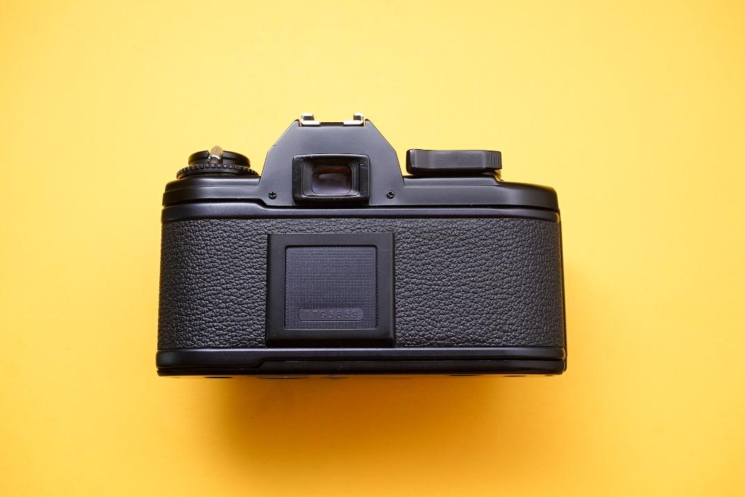 Nikon EM SLR film camera body, Photography, Cameras on Carousell