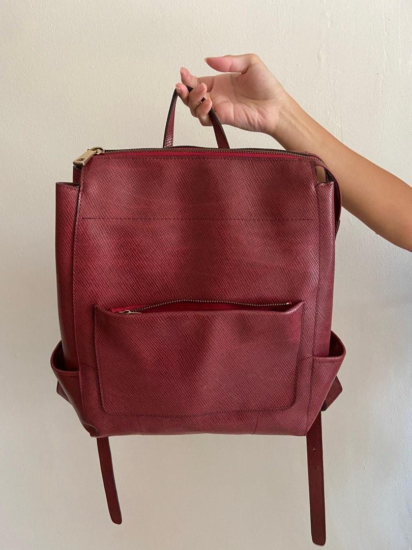 Red leather backpack handbag store