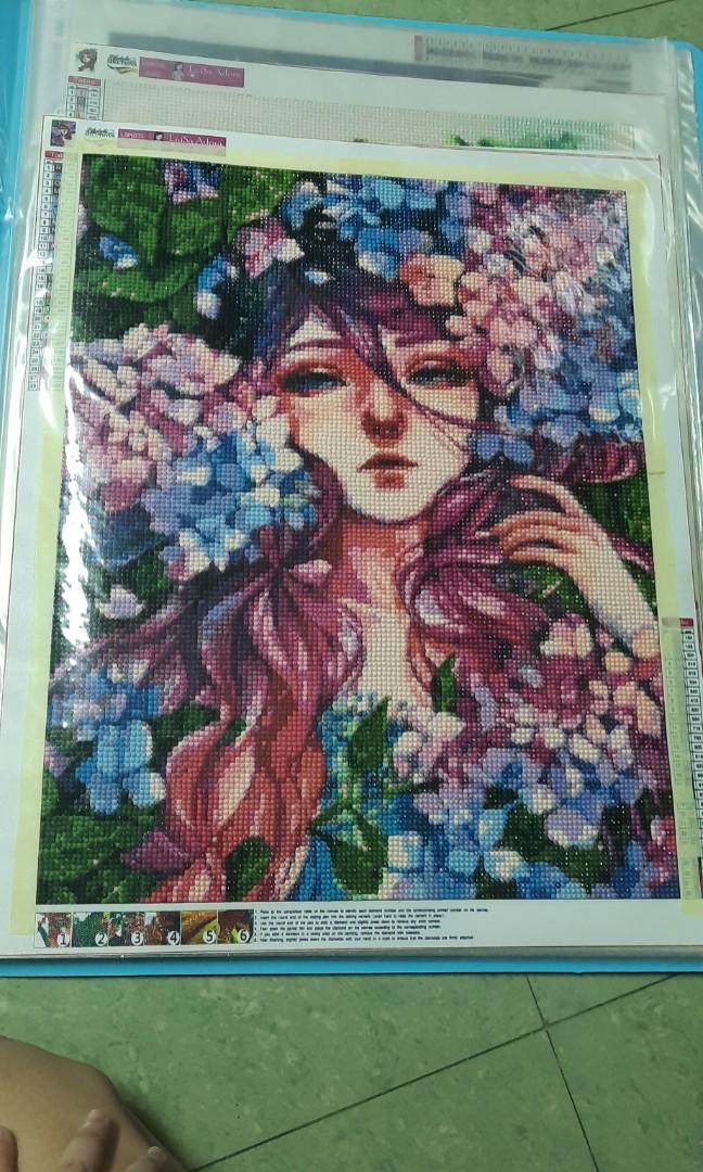 Unframed diamond painting large (Category: Art & Prints) located in San Juan City. Submitted by justanotherrandomshop (Listing ID 1180366347, Image 2). Description: the 1st picture is 40cm by 55cm is 500 the 2nd to 5 pictures are 40cm by 50cm are 450 2 or more paintings 400 each. DIY idea on last pic rfs. too many diamond painting, no place to frame, all are women faces if this have to be delivered this will be rolled outward(beads facing outside