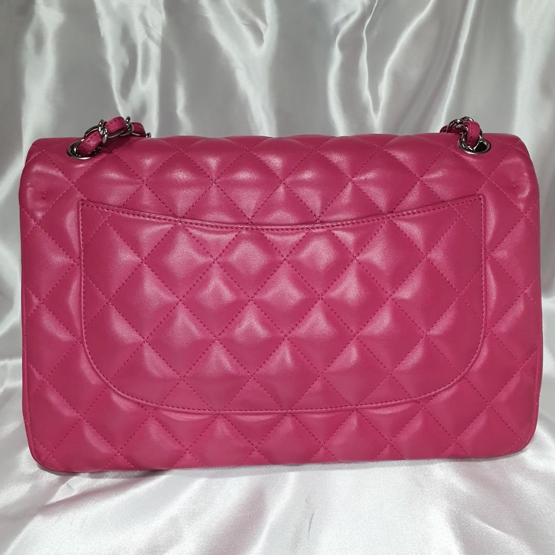 Chanel Classic Double Flap (Category: Luxury Bags & Wallets) located in Paranaque City. Submitted by my_travelfinds (Listing ID 1180566781, Image 2). Description: Chanel Classic Double Flap Jumbo Color: Hot Pink Hardware: Silver Leather: Lambskin Series: 19 Inclusions: dustbag, entrupy cert, authenticity card, holo intact Please manage your expectations when buying a preloved bag. No return/No exchange unless the item is proven fake by a certifie