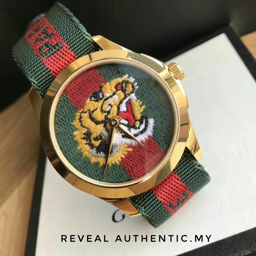 Gucci tiger face watch discount