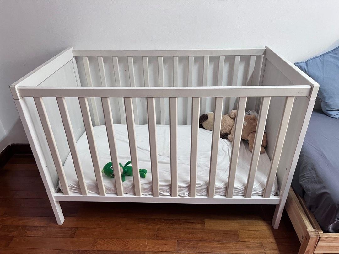 Cot outlet removable side