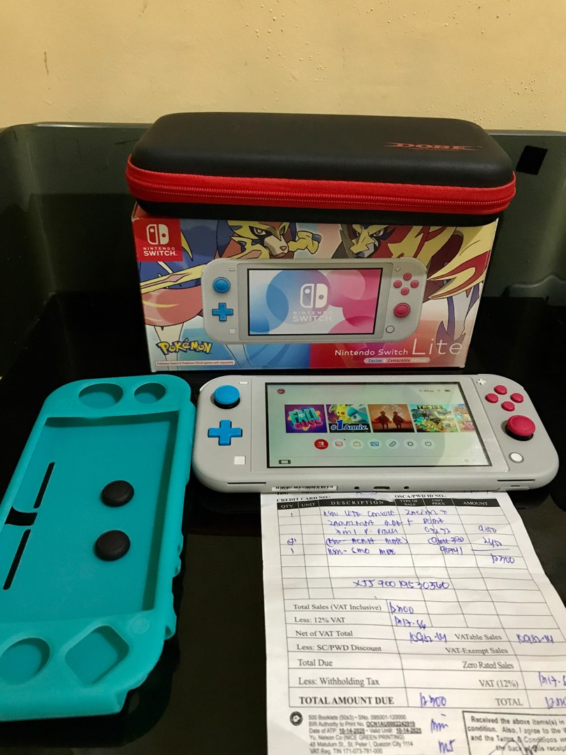Nintendo switch lite with games, Video Gaming, Video Game Consoles