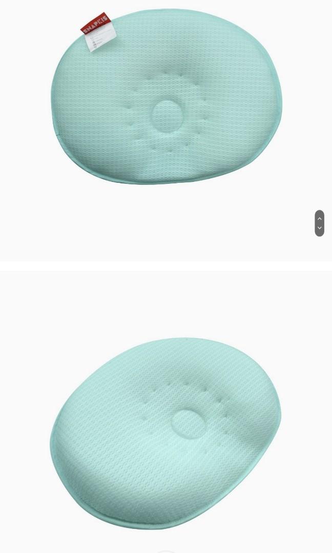 Snapkis Tencel Aeromesh Anti-Flat-Head Pillow (Category: Other Kids Furniture) located in Singapore. Submitted by racze (Listing ID 1180580949, Image 3). Description: Pillow is designed with a unique contour crater to help prevent and correct cranial deformities during infant's first months. Contouring helps maintain a proper sleeping posture with good spinal alignment. •Helps prevent flat-head •Made of 3D Aeromesh German technology •Breathable, 