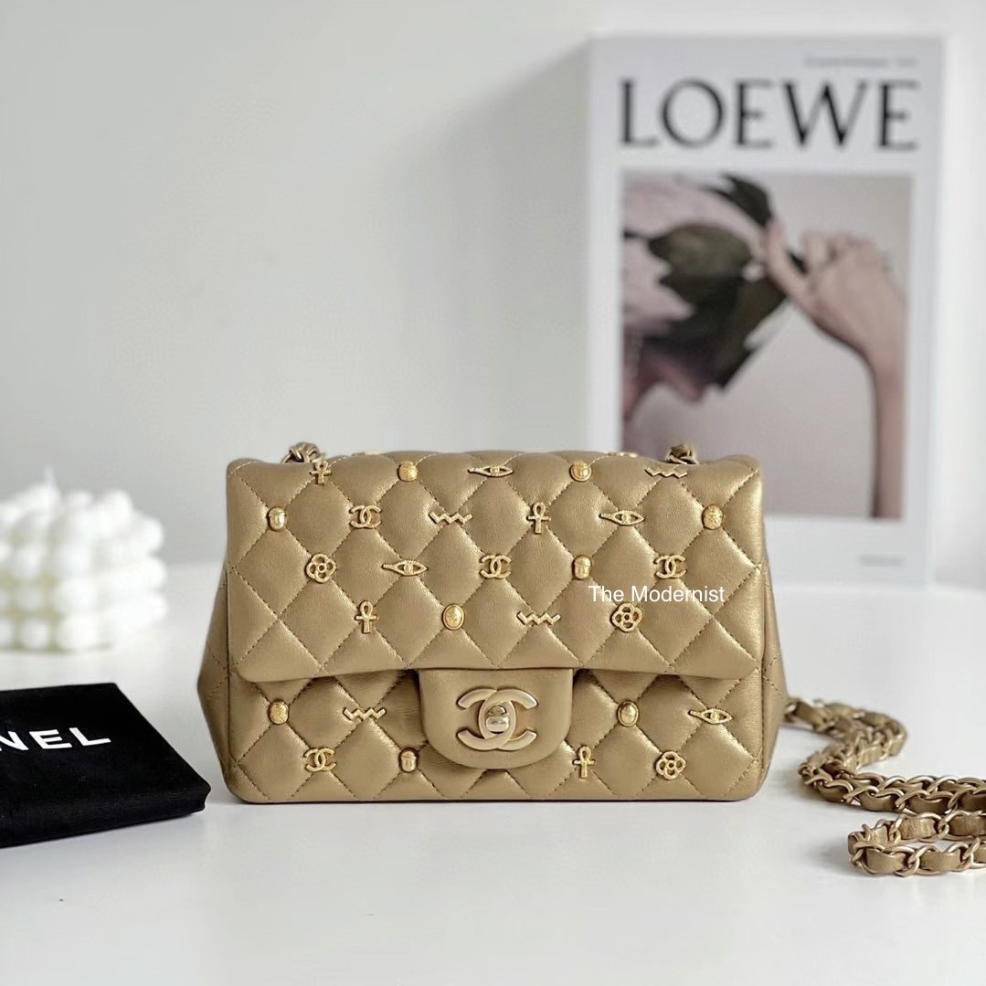 Authentic Chanel Gold Lambskin Mini Flap Bag with Charms 2018, Luxury, Bags  & Wallets on Carousell