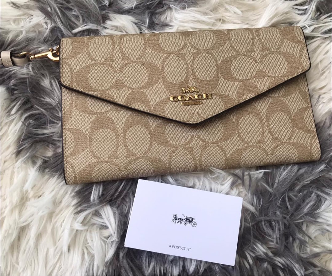 COACH travel envelope wallet light brown, Luxury, Bags & Wallets on
