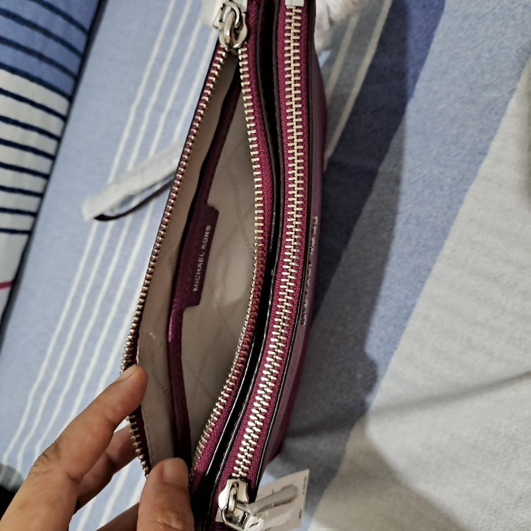 Michael Kors Mulberry Double Zip 💯%Authentic original (Category: Cross-body Bags) located in Quezon City. Submitted by ajaday (Listing ID 1180724534, Image 3). Description: Brandnew from Canada, Helping for a friend..