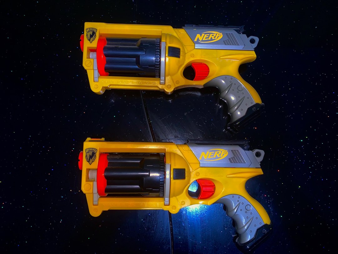 Preserved Old School Nerf guns with Glow in the Dark bullets