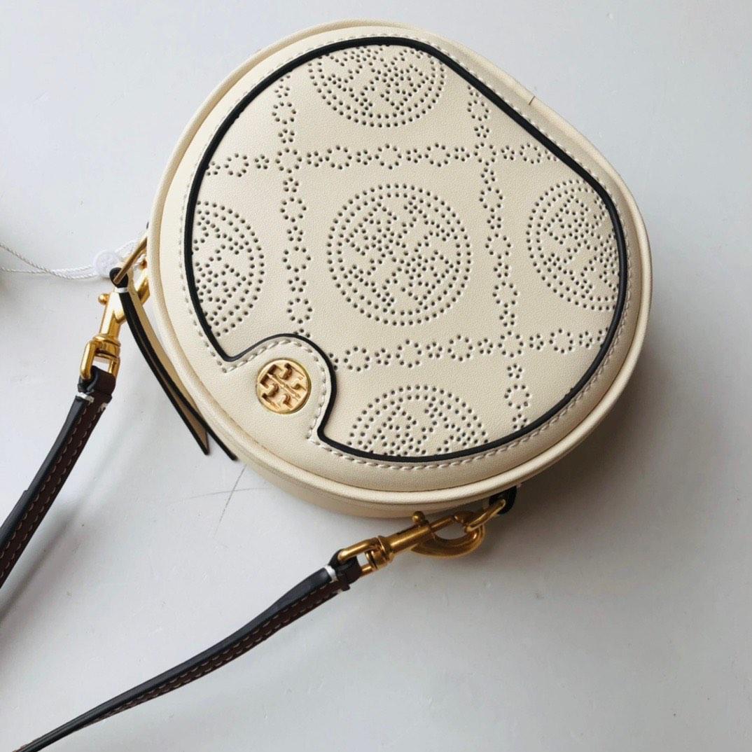 Original Tory Burch perforated round circle bag handbag, Luxury, Bags &  Wallets on Carousell