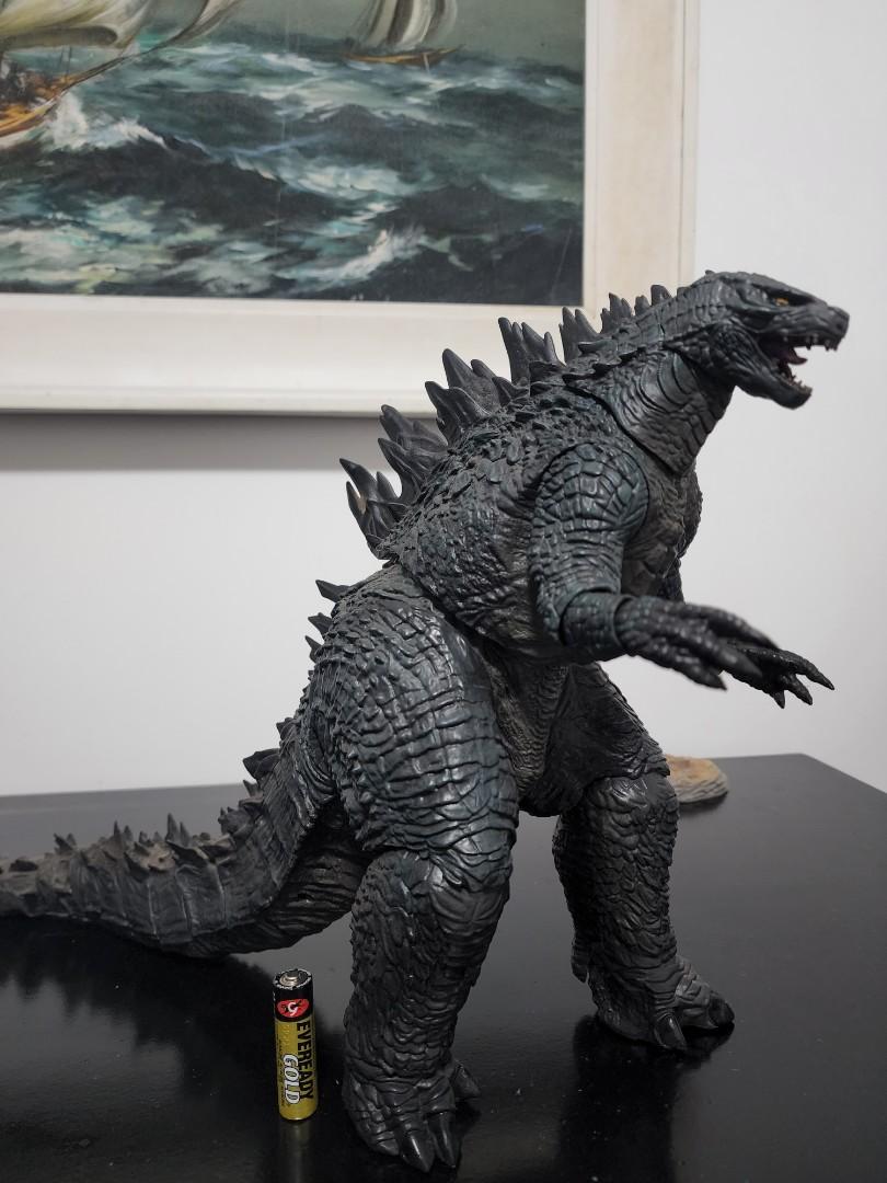 24 inch Godzilla (NECA 2014) (Category: Figurines & Statues) located in Quezon City. Submitted by r.diaz (Listing ID 1181036972, Image 1). Description: Huge hard to find Godzilla from NECA toys. He stands 12 inches tall and is 24 inches from tailtip to snout and is extremely detailed in sculpt. Only ever displayed in a smoke free home and never played with.
