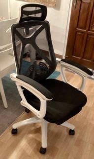 Ergonomic computer/office/study chair with movable footrest