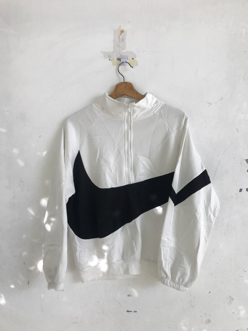 swoosh half zip
