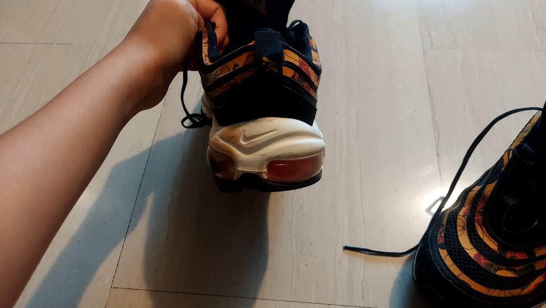 Nike 97 on sale black yellow