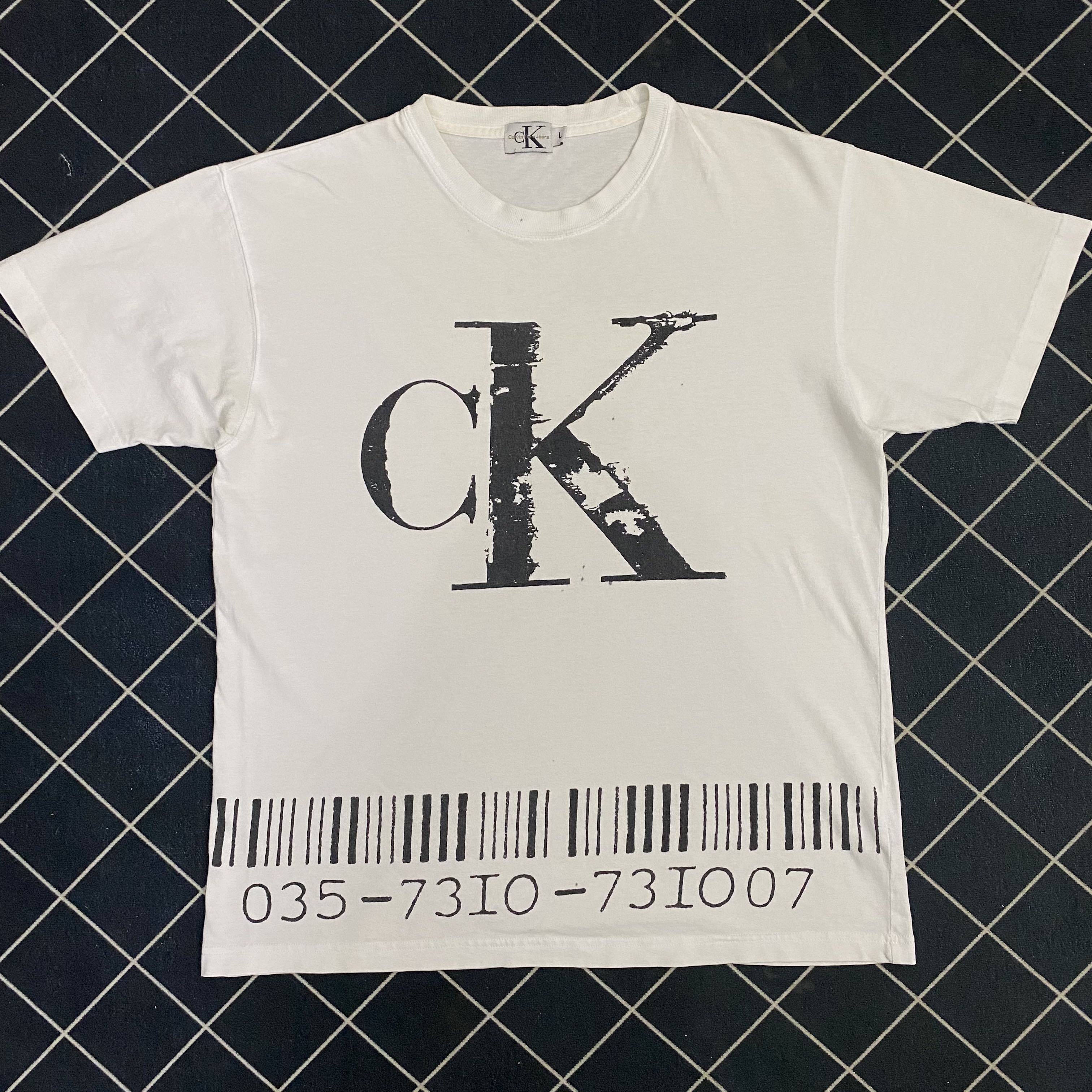 Vintage Calvin Klein Barcode, Men's Fashion, Tops & Sets, Tshirts & Polo  Shirts on Carousell