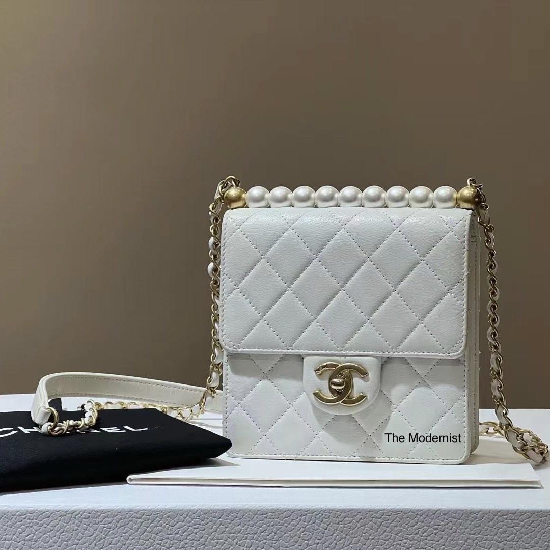 Authentic Chanel Pearl Vertical Flap Bag White