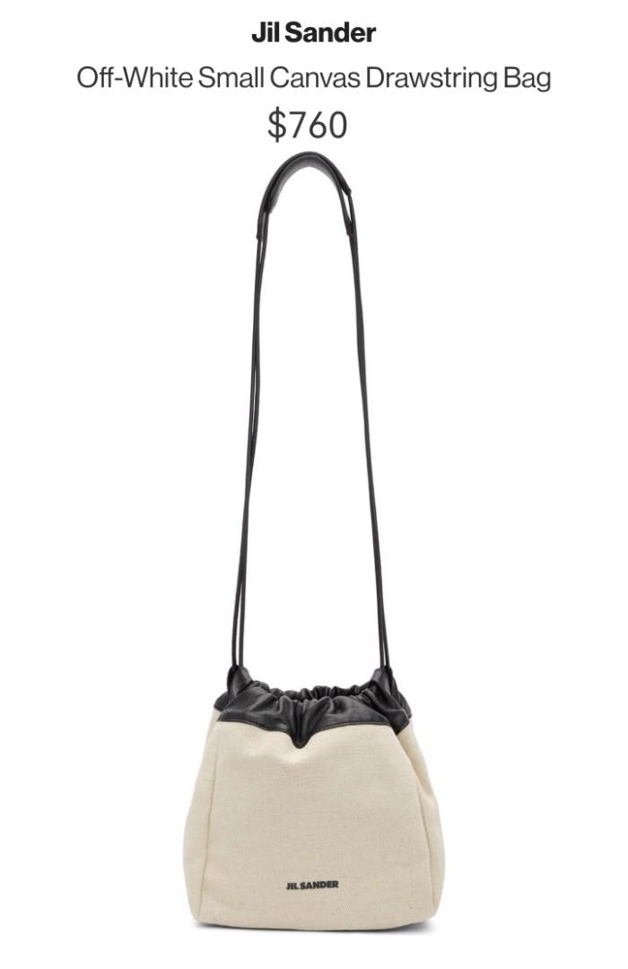 BNWT JIL SANDER Off-White Small Canvas Drawstring Bag (Category: Luxury Bags & Wallets) located in Makati City. Submitted by _collectorschoice_ (Listing ID 1181243472, Image 2). Description: Practice easy elegance with this bucket bag from Jil Sander. Made from canvas, it has an adjustable drawstring top, doubled shoulder straps and a deceptively spacious leather-lined Interior. This minimal and practical bag evokes the brand's understated and mo