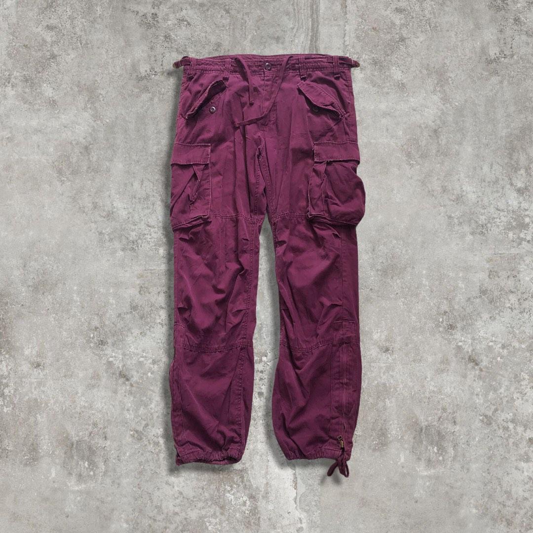 Burgundy high waist cargo pants with pockets and belt. Women's pants
