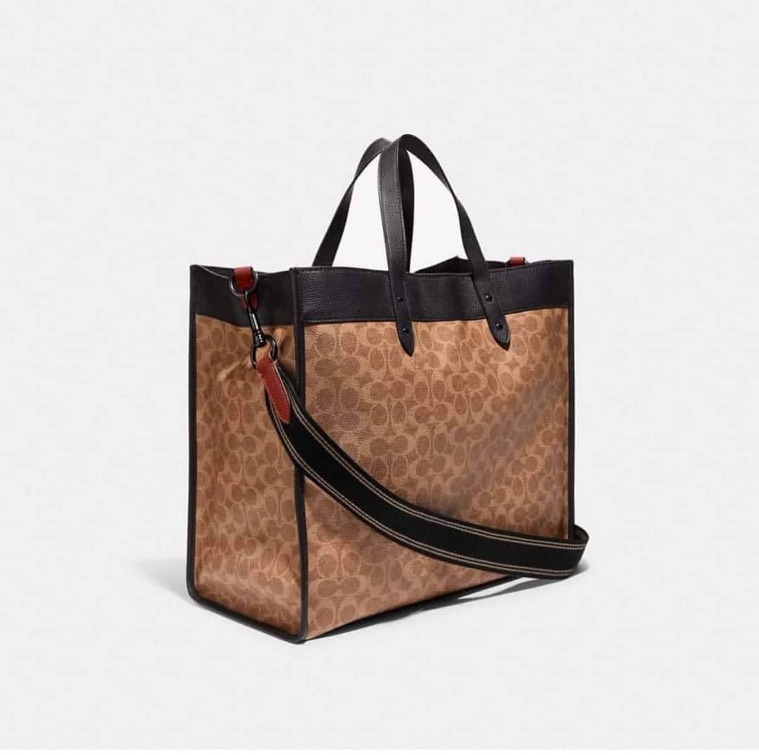 Coach Field Tote 40 (Category: Luxury Bags & Wallets) located in Cavite. Submitted by LuxbyMarifrance (Listing ID 1181182707, Image 3). Description: 📍Fits a 15” laptop. 🏷 3,000 only + SF 🛍 Field Tote 40 In Signature Canvas 📏 15 3/4” (L) x 14 1/2” (H) x 8” (W) 📌 with paper bag, dust bag and care card Disclaimer: LuxBagEtc is not associated or affiliated with the Brand. All trademarks, logos and brand names are the property of their respective