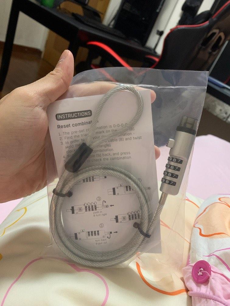 Computer lock (Category: Other Accessories) located in Singapore. Submitted by MarcLee_99 (Listing ID 1181251796, Image 2). Description: .