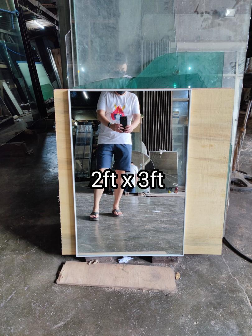 Rectangular mirror with frame (Category: Mirrors) located in Malabon City. Submitted by mirrors.ph (Listing ID 1181147678, Image 1). Description: Rectangular mirror in white aluminum frame and plywood backing. Using 6mm thick copper free lead free mirror. Size: 2ft x 3ft P1620 Add P200 if with back hook. Available colors gold, glossy black, matte black, white and silver aluminum frame. Customize sizes and shapes are welcome..