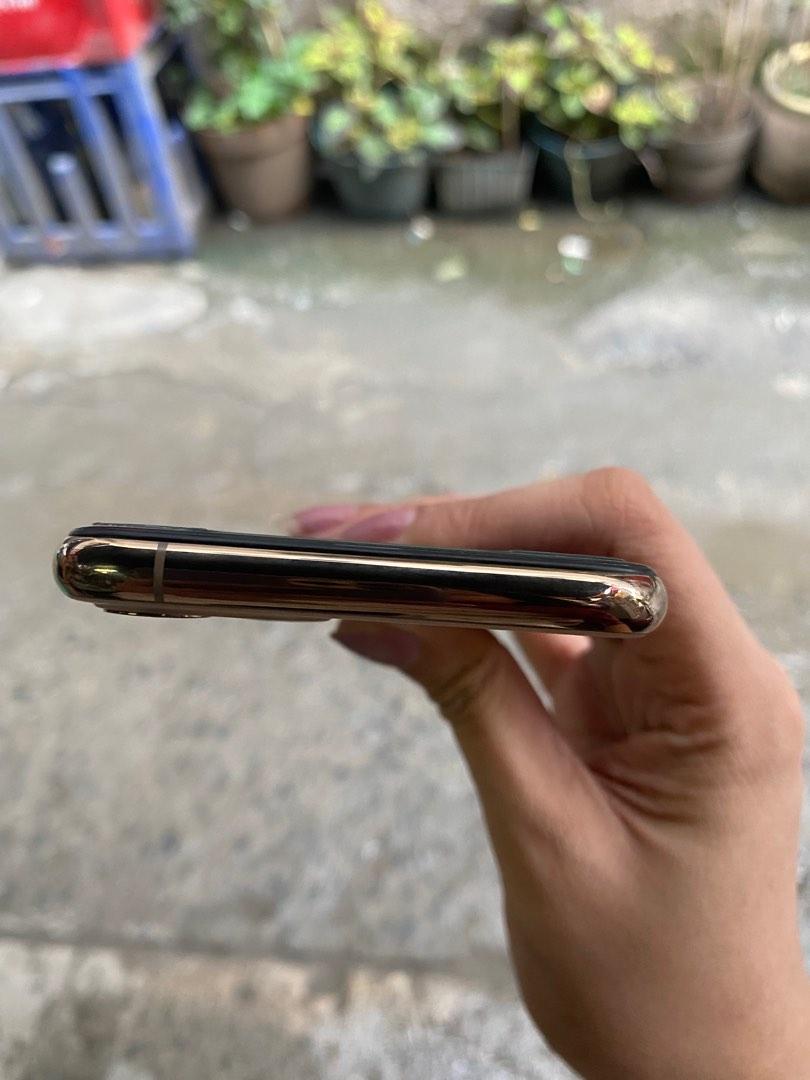 11 pro (Category: iPhone 11 Series) located in Manila. Submitted by ashanti_21 (Listing ID 1181377408, Image 3). Description: 11 pro gold 64gb Factory Unlocked face id true tone worked. 📲.