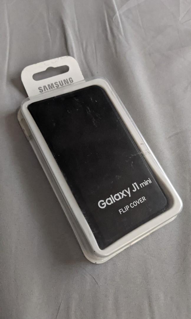 Authentic/Legit Samsung Galaxy J1 Mini Flip Cover Case (Category: Cases & Sleeves) located in Quezon City. Submitted by declutteringthingz (Listing ID 1181321683, Image 1). Description: brand new Authentic/Legit Samsung Galaxy J1 Mini Flip Cover Case with box.