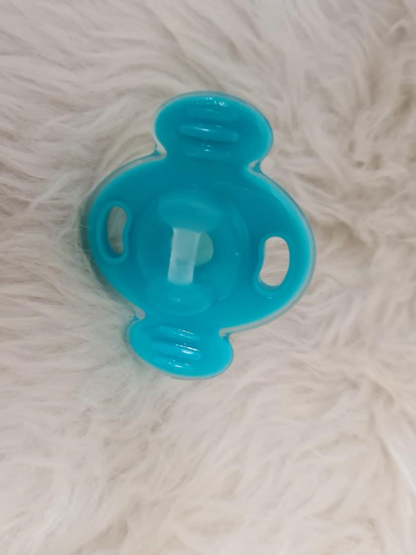 Authentic Dr. Brown's Orthees Transition Teether (Category: Soothers & Pacifiers) located in Quezon City. Submitted by rachel021 (Listing ID 1181370821, Image 2). Description: Ease the teethe with Dr. Brown’s™ Orthees™ - the teether made for front and back teething. Designed by a pediatric dentist, Orthees teethers safely soothe while aiding little jaws to develop alongside baby teeth. As baby begins to bite and chew, the unique shape of Orthees 
