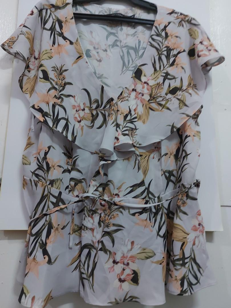 Formal Floral Blouse XL (Category: Blouses) located in Makati City. Submitted by heryet (Listing ID 1181414000, Image 2). Description: pretty floral wrap around blouse can fit up to XL frame.