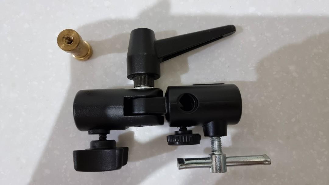Manfrotto Lite Swivel Umbrella Adapter (Category: Other Photography Accessories) located in Binangonan. Submitted by caaaris (Listing ID 1181465282, Image 1). Description: Manfrotto Lite Swivel Umbrella Adapter Full rotation due to swivelling head Included is a 5/8 in stud with female 3/8 in and 1/4 in threads Incomplete Set: not included is a 5/8 in stud with male 3/8 in and 1/4 in threads Still in excellent condition Made in Italy.