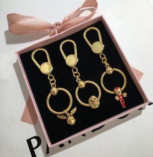 Pandora gold keychain/keyholders with set of gold charm