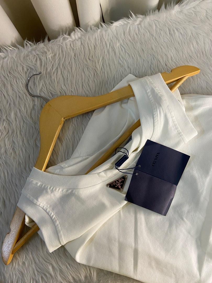 Prada white sleeveless tank top pre order (Category: Luxury Apparel) located in Mandaluyong City. Submitted by japanandsingaporeluxepreloved (Listing ID 1181506503, Image 1). Description: All sizes are available for preorder Diclaimer: we are not affiliated with the brand stated in this post, no infringement intended. All copyrights are reserved to its brandowners ..