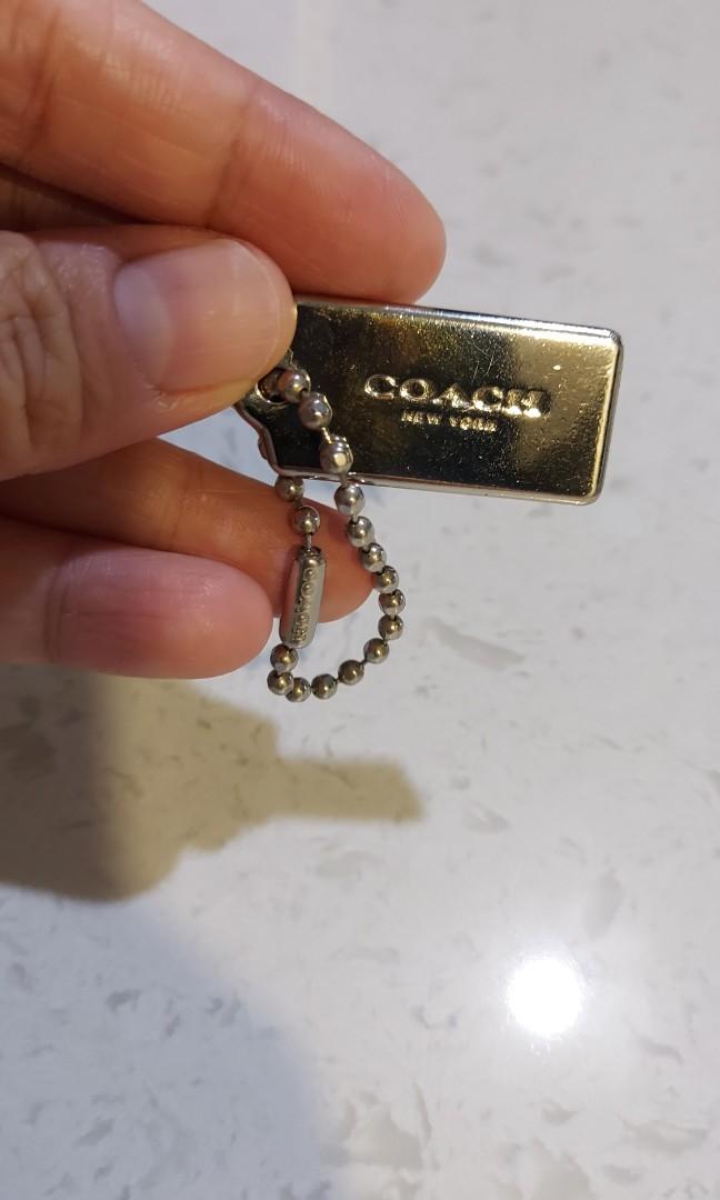 Coach dog tag 2025