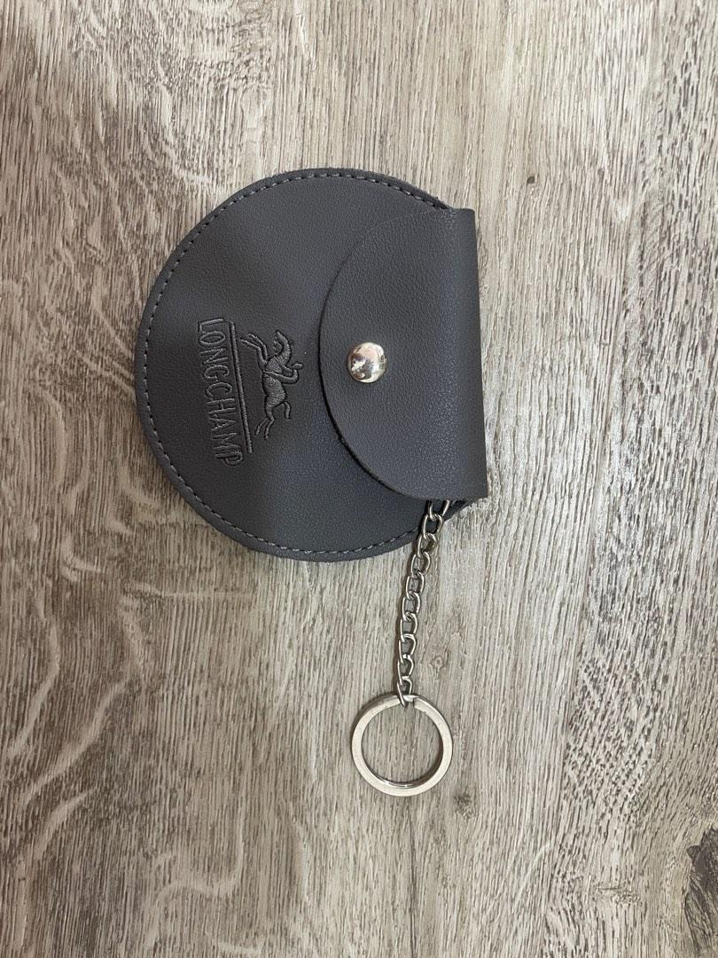 longchamp coin purse grey (Category: Purses & Pouches) located in San Juan City. Submitted by yanisprelovedthings (Listing ID 1181584363, Image 1). Description: longchamp never used no packaging 100 pesos only LOC: san juan city MOP: gcash BDO MOD: lalamove/grab, gogo xpress, lbc .