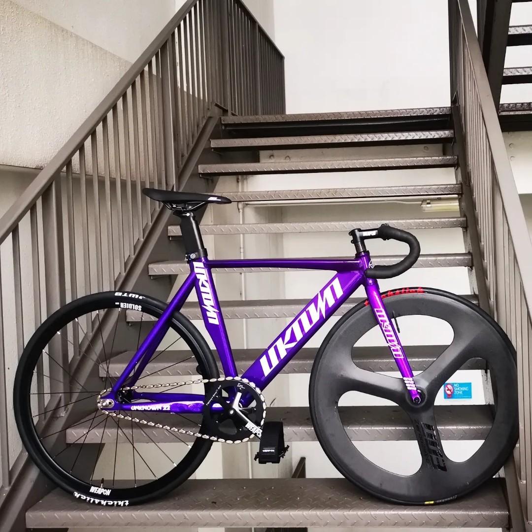 Unknown fixed gear bike single speed Singularity frameset 690 complete bike 990 Weapon alloy groupset Aero frame design multiple