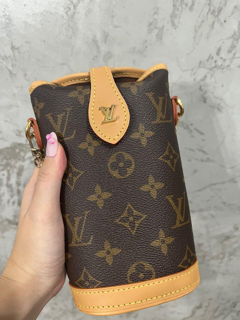 LV Fold Me Pouch Louis Vuitton Sling Bag, Women's Fashion, Bags & Wallets,  Cross-body Bags on Carousell