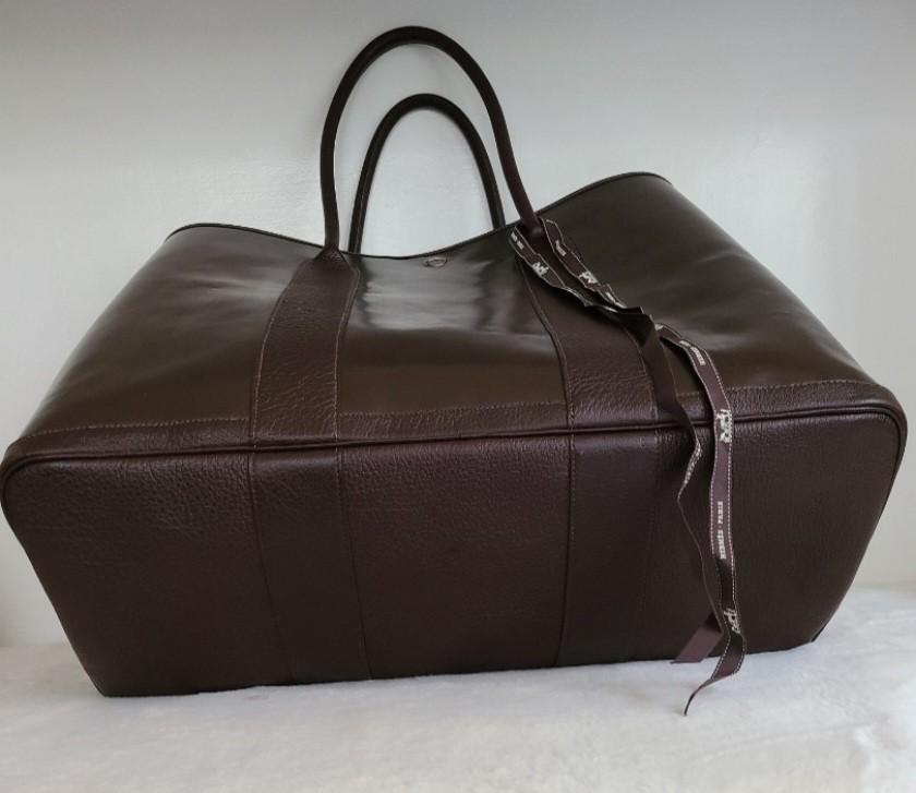Hermes Garden Party 36MM Amazonia (Category: Luxury Bags & Wallets) located in Quezon City. Submitted by hapiyumi (Listing ID 1176395315, Image 2). Description: Brown Amazonia Leather w/ skipper leather details Palladium Hardware Letter Stamp E Dimensions 14"x 10" x6.5" Handle drop 8" Comes with dustbag.