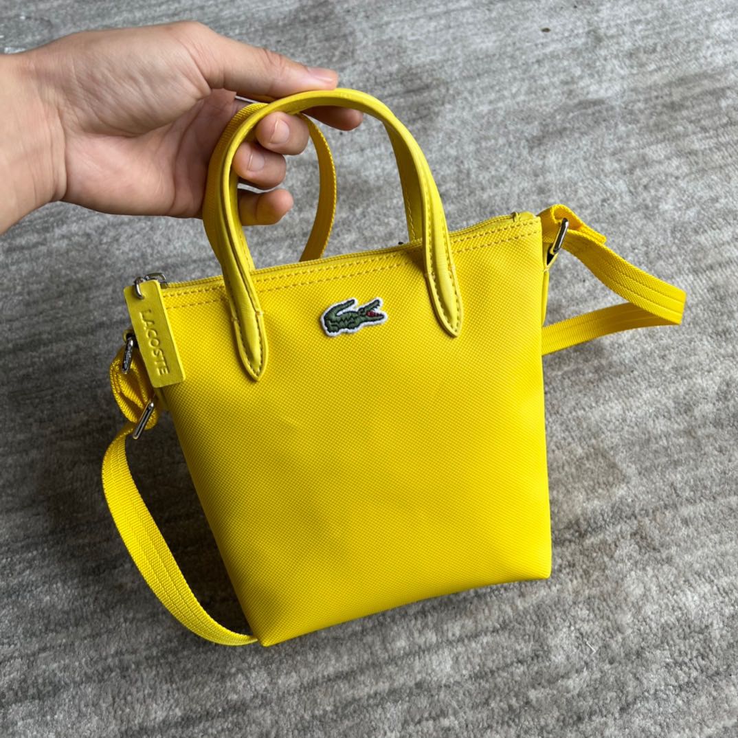 Lacoste yellow bag store