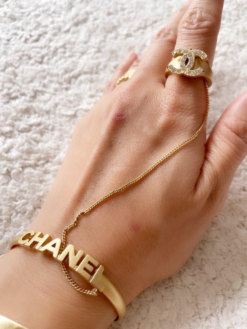 Authentic Chanel chained ring with bracelet