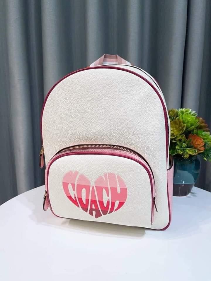 coach heart backpack Munster  Johnnie Brocks Printed coated canvas and refined pebble leather Inside zip and multifunction pockets Double zip closure fabric lining Handle with 2 1/4 drop Outside zip pocket Adjustable shoulder straps 10 3/4 (L) x 12 1/2 (H) x 4 3/4 (W) Style No. Coach Court Backpack with Stripe