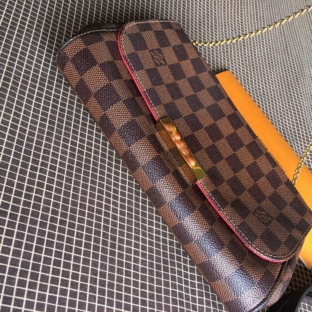 Authentic Louis Vuitton Favorite MM Damier Ebene (Category: Luxury Bags & Wallets) located in Quezon City. Submitted by thingsforless (Listing ID 1181785377, Image 3). Description: AUTHENTIC Louis Vuitton Favorite MM in Damier Ebene ❤️HARD TO FIND. Discontinued Designer Piece ❤️Made in France (Year 2018) ❤️Still in very good condition. Rank A -SA ❤️No major flaws to mention just minimal signs of usage. Minimal hairlines on LV plate. ❤️Damier Eben