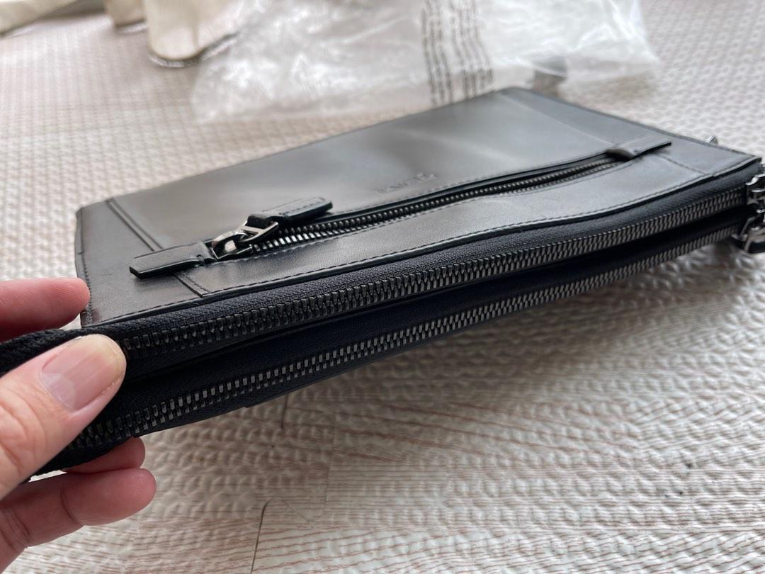 Tumi clutch man on sale