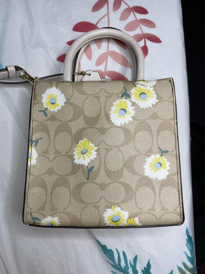 mini cally crossbody in signature canvas with daisy print